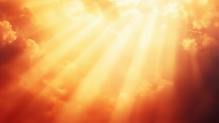 Obraz premium Glowing sun rays through golden clouds