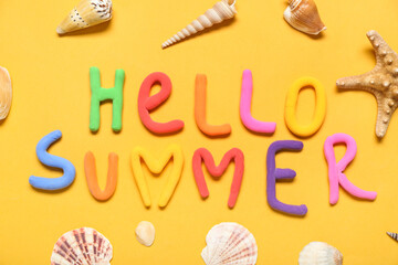 Composition with text HELLO SUMMER and beautiful seashells on color background