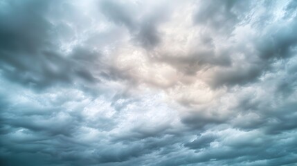 Obraz premium Overcast Sky: A sky covered with thick, gray clouds, setting a mood of calm and introspection. 