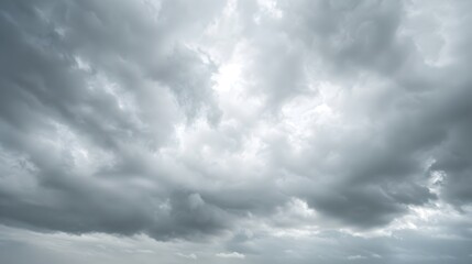 Obraz premium Overcast Sky: A sky covered with thick, gray clouds, setting a mood of calm and introspection. 