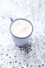 Cappuccino on bright background. Soft focus. Copy space	