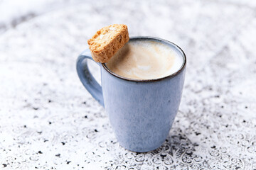 Cappuccino on bright background. Soft focus. Copy space	