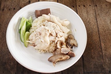 Steamed rice topped with chicken Singapore street food