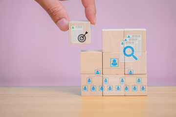 The Wooden cube box with human recuirtment icon concept
