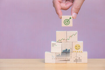 The Wooden cube box with uptrend investment concept