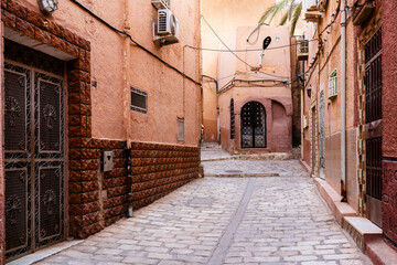 Traditional architecture of Ghardaïa, Algeria – View of the mud houses and minaret of the old town