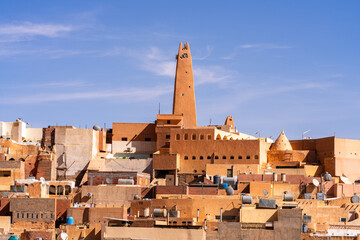 Traditional architecture of Ghardaïa, Algeria – View of the mud houses and minaret of the old town