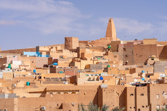 Traditional architecture of Gharda&iuml;a, Algeria &ndash; View of the mud houses and minaret of the old town