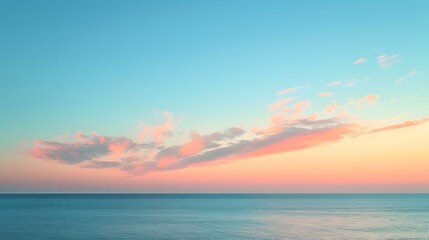 Fototapeta premium Sky at Dawn: A tranquil dawn sky with soft pastel colors and the first light of day breaking over the horizon. 