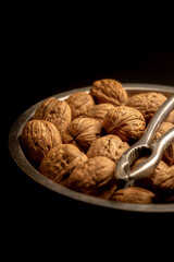 Bowl of Walnuts with Nutcracker