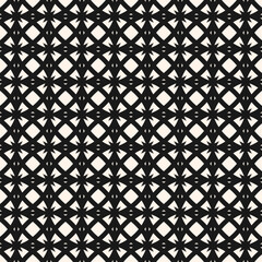 Vector abstract seamless pattern. Black and white floral geometric grid texture. Elegant monochrome background with flowers, diamond shapes, lattice, net, mesh. Repeated design for decor, cover, print
