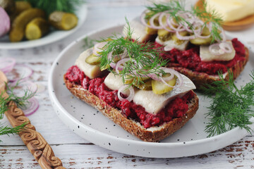 Scandinavian sandwiches with herring and beetroot