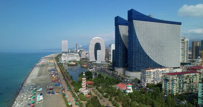Batumi city, Georgia aerial view. Drone view of high-rise buildings, seafront, attractions and park. Resort town. Contrast of old and new architecture. Batumi