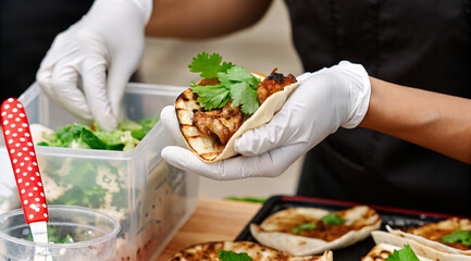 Food safety day, An appetizing shot of a freshly prepared taco, showcasing the grilled meat filling, vibrant cilantro garnish, and a soft tortilla