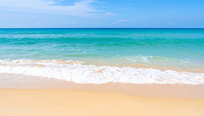 Fototapeta premium Beautiful sandy beach and soft blue ocean wave. Sea background
