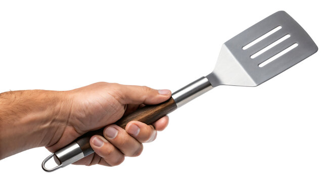 hand holding spatula isolated