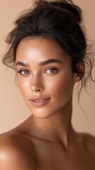 Obraz premium Portrait of young caucasian woman with updo hairstyle and natural makeup