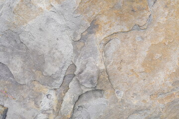 Natural cracked stone pattern background.