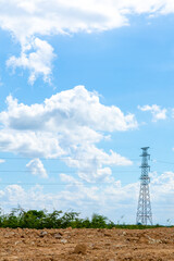 Power Line Transmission Tower on a Dry, Dusty Landscape © Chetra168