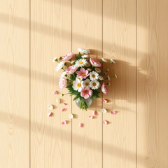 Mothers Day flatlay with flowers in vase and softly lit wooden table b