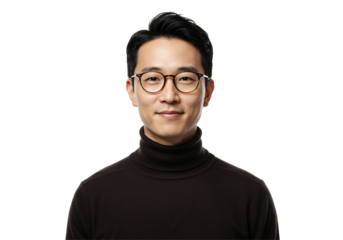 A young Asian man in a black turtleneck sweater poses for a portrait against a dark background, showcasing a confident and friendly expression with glasses on his face.