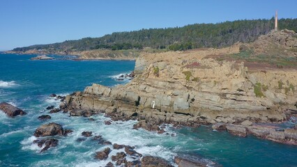 Coastal cliffs along California's Highway 1 in Northern California. Rugged ocean rocks, crashing...