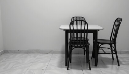 Fototapeta premium Empty dining area with a table and three chairs.