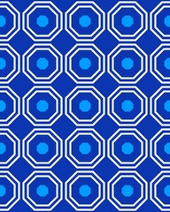 Complex geometric design features octagons in various shades of blue against a bright blue background, creating a visually striking effect