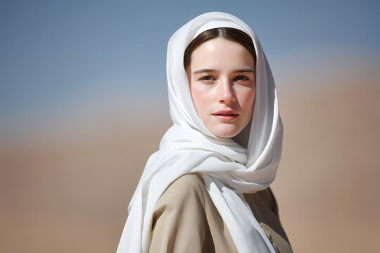 Fototapeta light minimalist portrait set against desert dune field in libya at high noon