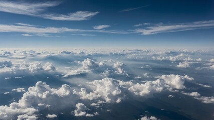 Obraz premium Aerial View of Cumulus Cloudscape Stunning Blue Sky and White Clouds from Above