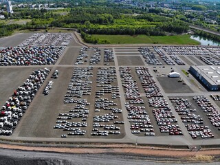 Plakat New cars stock in a logistics parking lot in Poland