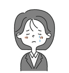 スーツを着た女性社員の涙を流して悲しい顔