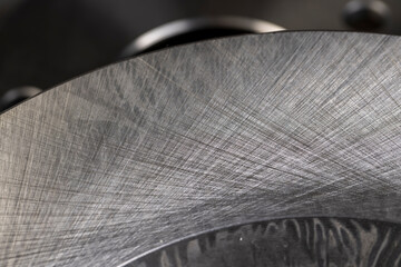 steel with notches, a high-quality brake disc for a car that has not been in use, a disc for the...
