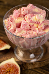 sweet ice cream and sliced red fig fruits closeup