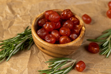 boiled with sugar syrup candied fruits of small fruits of kumquat, There are green spices on the...