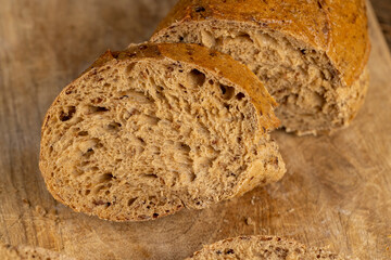 a healthy loaf of soft bread with added seeds and bran