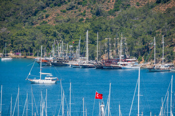 boats are anchored in fethiye bay boats masts are visible