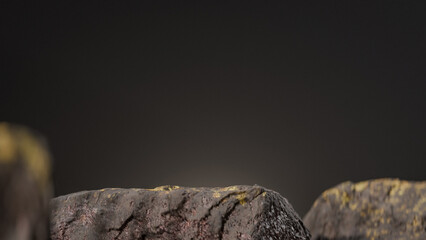 Bottle of perfume is shown on a rocky surface. The bottle is black and has a black cap. The bottle is placed on a rock, and the rock is surrounded by other mossy rocks. Premium photo 3d render.