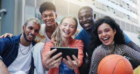 Obraz premium Friends, people and laughing with selfie in city for funny social media update, happy memory or profile picture. Diversity, group and photography in urban town with bonding, support and internet post