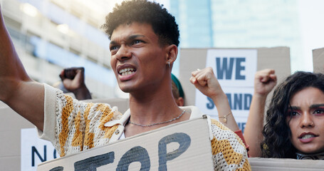 Protest, man and people with poster in city for equal rights, economic change and stop inequality...
