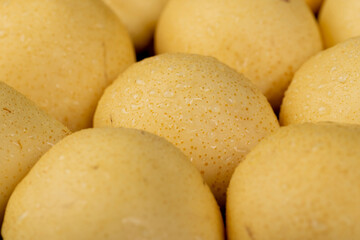 sweet fresh white pear in the kitchen closeup