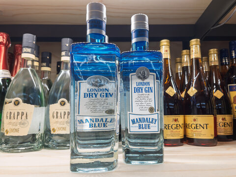 London Dry Gin - Mandaley Blue Bottles Displayed on Shelf