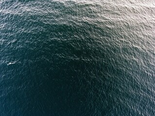 High-angle view of dark ocean surface texture.
