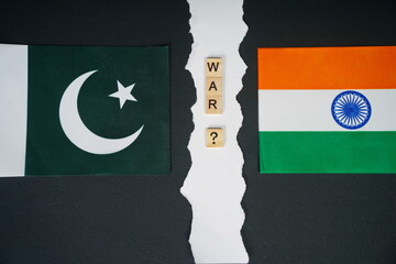 Flags of India and Pakistan and the inscription: War.