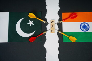 Flags of India and Pakistan and the inscription: War.