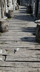 Aged Wooden Plank Walkway In A Narrow Alleyway