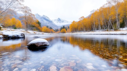 Obraz premium Winter's autumnal embrace. Tranquil river reflecting snowy mountains and golden aspen trees