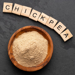 Cicer arietinum - Organic chickpea flour in the bowl.