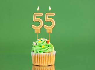 Birthday card with candle and cupcake - Number 55 on a green background