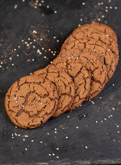 cookies with chocolate close up, chocolate biscuits with cocoa and sesame